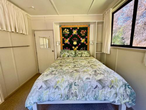 Llit o llits en una habitació de Ridgehaven Accommodation