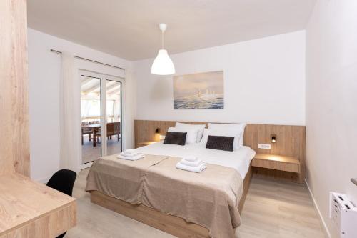 Family-friendly apartments with swimming pool Palit, Rab - 24995