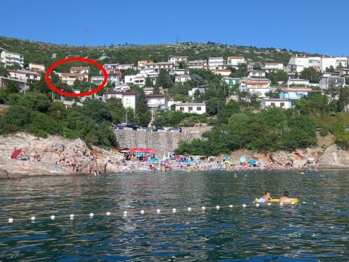 Apartments with parking space Senj - 25225