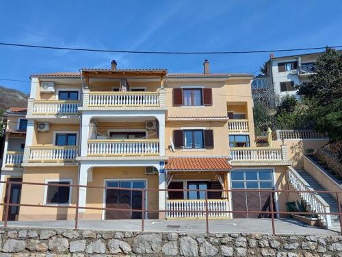Apartments with parking space Senj - 25225