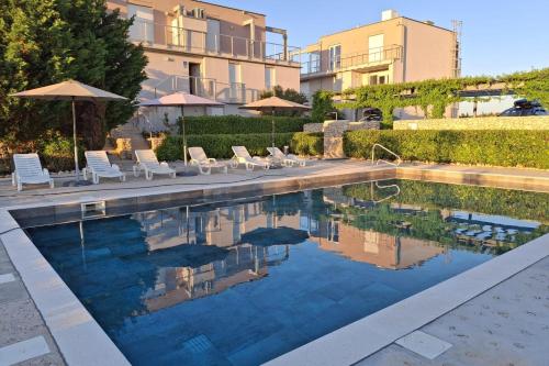 Family-friendly apartments with swimming pool Povljana, Pag - 25291