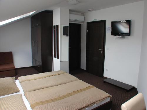 Rooms Levickiにあるテレビまたはエンターテインメントセンター