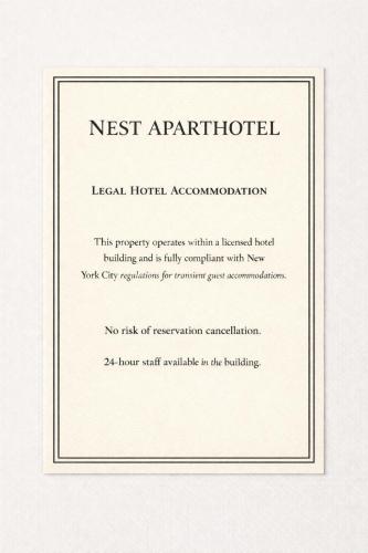 a framed certificate with a list of procedures in a document at Nest Family Aparthotel - No Window in New York