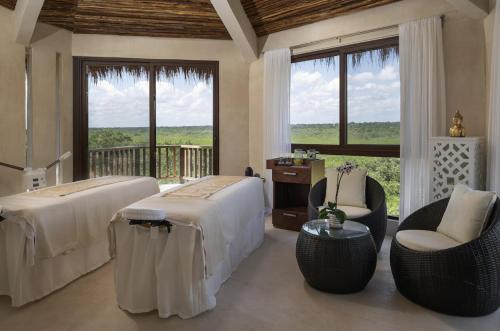 Una cama o camas en una habitación de Nerea Tulum