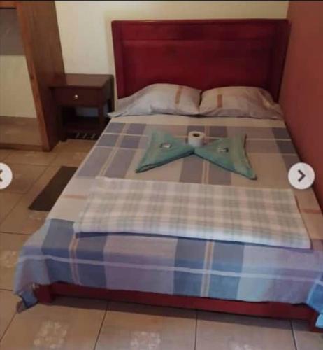 Llit o llits en una habitació de Hotel bulaba