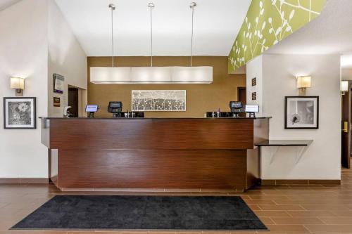 a lobby of a hotel with a reception desk at Sleep Inn at Greenville Convention Center in Greenville