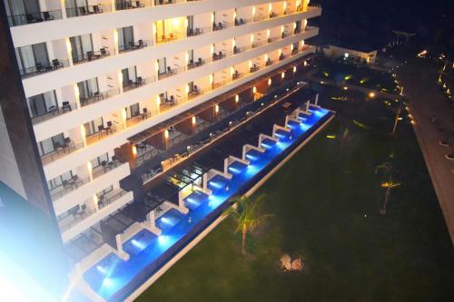 an overhead view of a building with blue lights at Royalton Blue Waters Montego Bay, An Autograph Collection All-Inclusive Resort in Falmouth