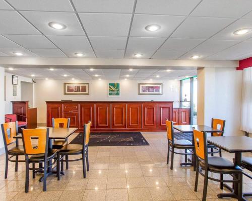 a dining room with tables and chairs in a room at Quality Inn Dyersburg I-155 in Dyersburg