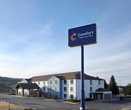 a sign for a car port in front of a building at Comfort Inn & Suites Summerset - North Rapid City in Summerset