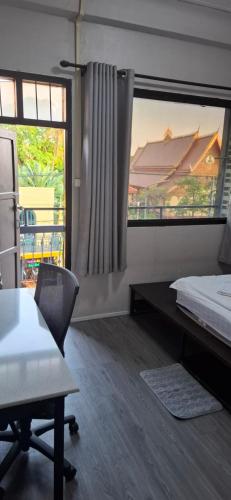 En eller flere senge i et værelse på Mekong Riverside