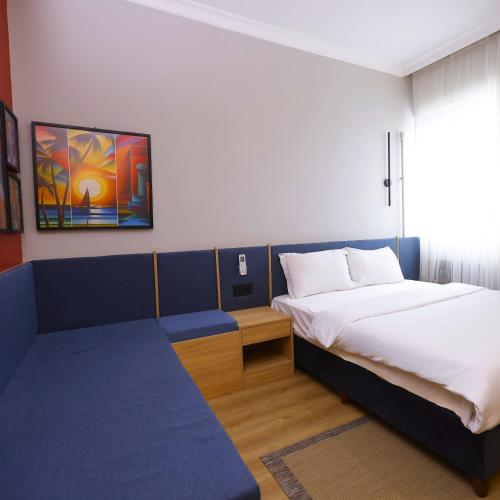 Katil atau katil-katil dalam bilik di Esin Hotel