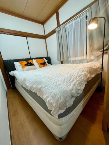 AiES Kita-Senju, 1st floor, 8-minute walk from Kita-Senju Station, direct access to Tokyo Skytree, Asakusa, Akihabara, Ueno, Ginza, Roppongi, Shibuya, 3 beds, maximum occupancy 4 people, 40 square meters with Kitchen appliances