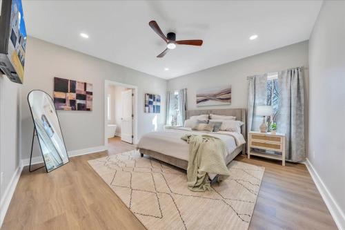 a bedroom with a bed and a ceiling fan at Lake Twin Cove - New! in Moneta