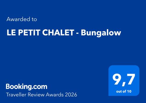 a blue sign with the words le petit chittel burgerumbledore at LE PETIT CHALET - Bungalow in Waulsort