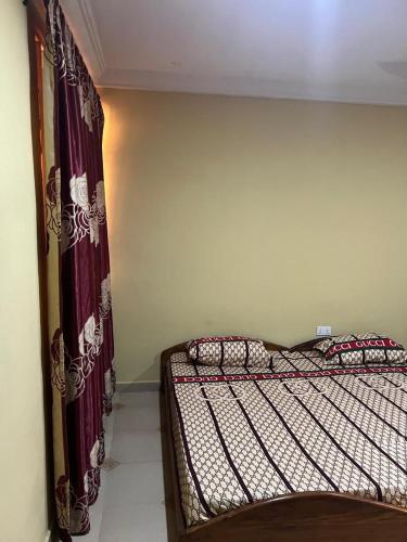 Llit o llits en una habitació de Cyjevic Plaza