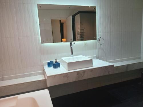 Vannas istaba naktsmītnē Hotel FG