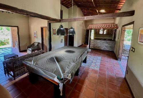 a room with a bed in the middle of a room at Mango Village Paracuru CE in Paracuru
