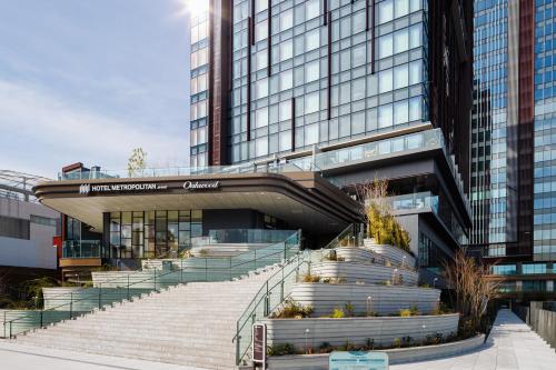 a building with stairs in front of a building at HOTEL METROPOLITAN OIMACHI TRACKS Tokyo in Tokyo