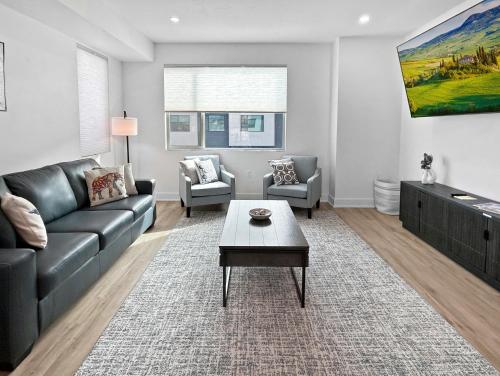 a living room with a couch and a coffee table at Terrace at Two Rivers townhouse in Grand Junction