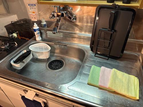 a sink in a kitchen with a sink at BreakPoint in Ichinomiya