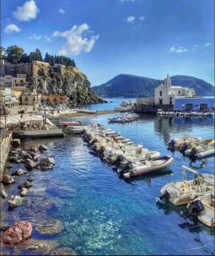 a bunch of boats are docked in a harbor at Via Roma 55 in Lipari