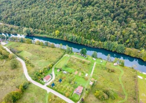 an aerial view of a park next to a river at Apartman Anna & Kamp Elza in Bihać