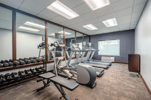 a gym with treadmills and machines in a room at Fairfield Inn & Suites by Marriott Atlanta Kennesaw in Kennesaw