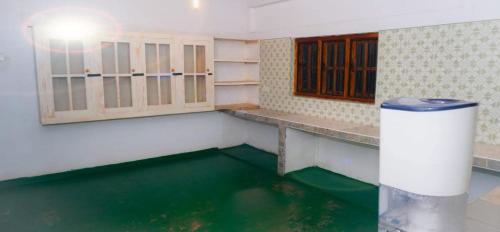 a room with a large pool of water in a room at V6 Nest in Hali Ela