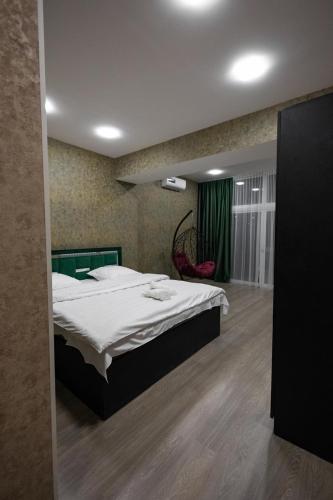 a bedroom with a large bed in a room at Dream home in Vanadzor