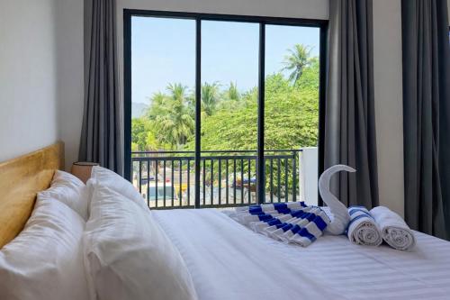 Llit o llits en una habitació de Hiraya