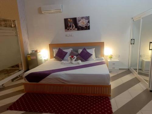 Postel nebo postele na pokoji v ubytování Gloriaka Hotel
