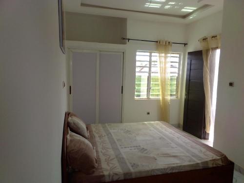 Llit o llits en una habitació de 3M Résidence