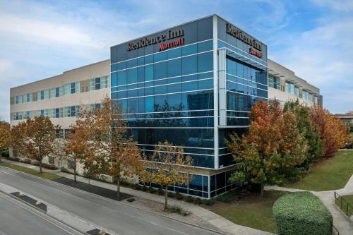 an office building with a sign on top of it at Residence Inn by Marriott Austin Northwest/The Domain Area in Austin
