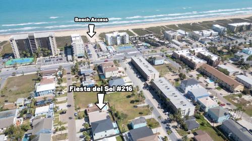 an aerial view of the beach in front of a city at Walkable Location - 99 Steps to Beach - Pool in South Padre Island