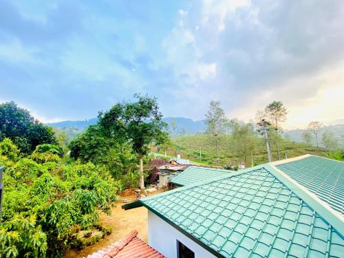 an overhead view of a house with a green roof at Haputale Hills Holiday Home in Haputale