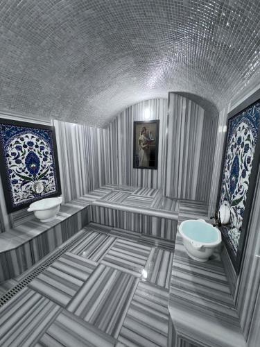 a visualization of a bathroom with a tub and a sink at The Montana City Hotel in Bostaniçi