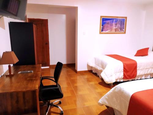 Llit o llits en una habitació de CASA TALIOS