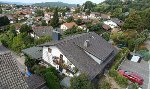 an overhead view of a house in a residential neighborhood at Villa Relax - Ferienwohnungen & Hallenbad & Relaxgarten in Bodenmais
