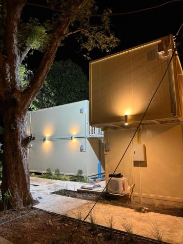 a large object with lights on the side of a building at Sand Bara in Ban Pak Ba Ra