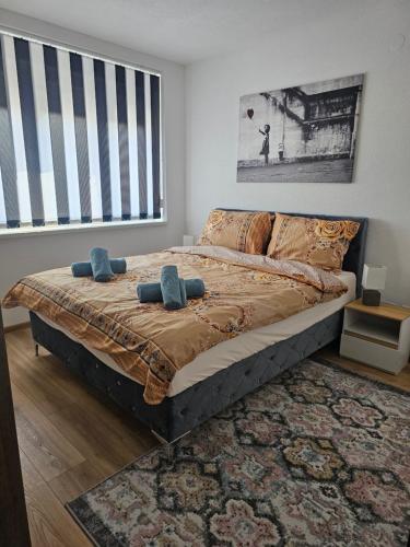 Llit o llits en una habitació de Apartman Iman1