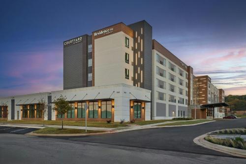 a rendering of a large building on a street at Residence Inn by Marriott Madison in Madison