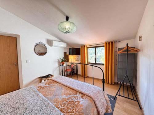 a bedroom with a bed in a room at Lovely Room Silves in Silves