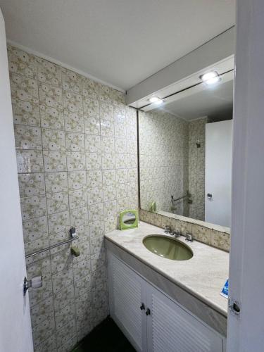a bathroom with a sink and a mirror at Celestia in Punta del Este