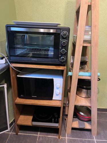 Kjøkken eller kjøkkenkrok på Gîte Olivia