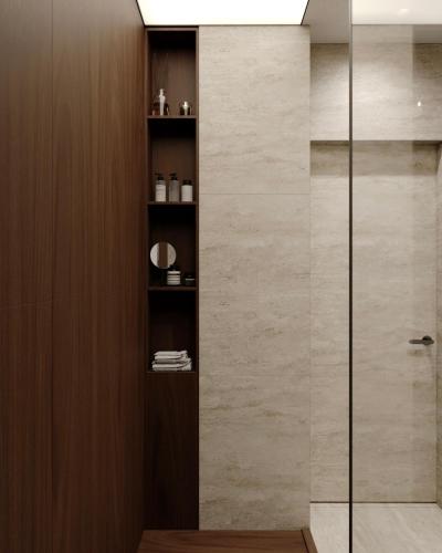 a shower with a glass door in a bathroom at Apart-hotel Centr in Sumy