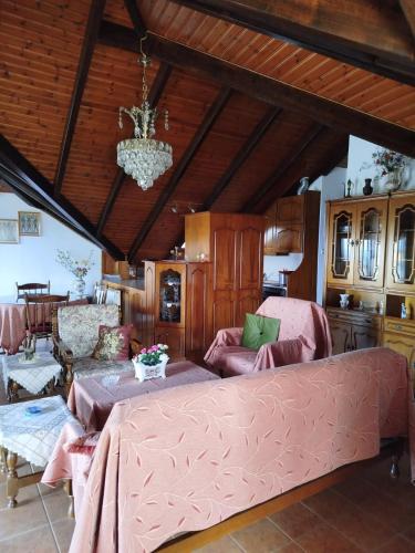a bedroom with a large bed in a room at Anastasia in Áno Lekhónia