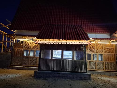 a small building with a roof with lights on it at Sunya Homestay in Kirāntīchhāp