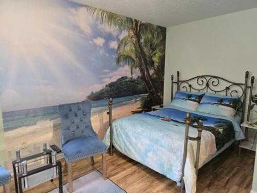 a bedroom with a bed and a beach mural at vacation paradise in Ararat