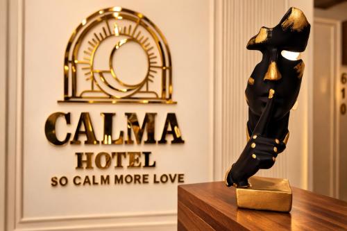 a trophy on a table in front of a hotel at Calmaa Kairo in Cairo