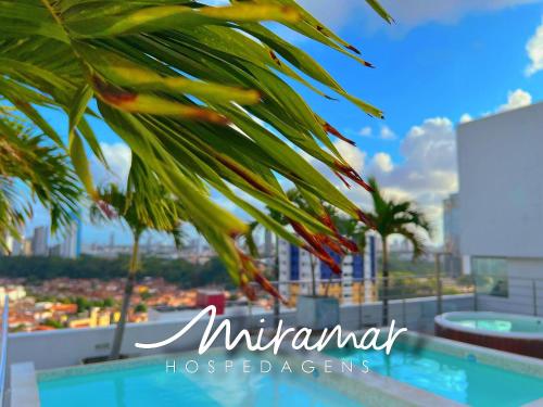 a view of the city from the balcony of an apartment at Lindo flat no Manaíra Apart Hotel in João Pessoa